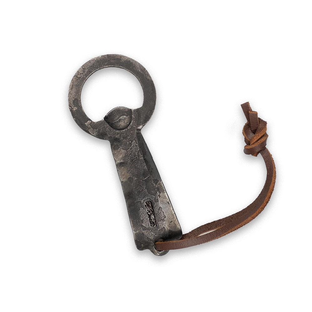 Rosellis hand crafted bottle opener made from spilled materials of our premium carbon steel.