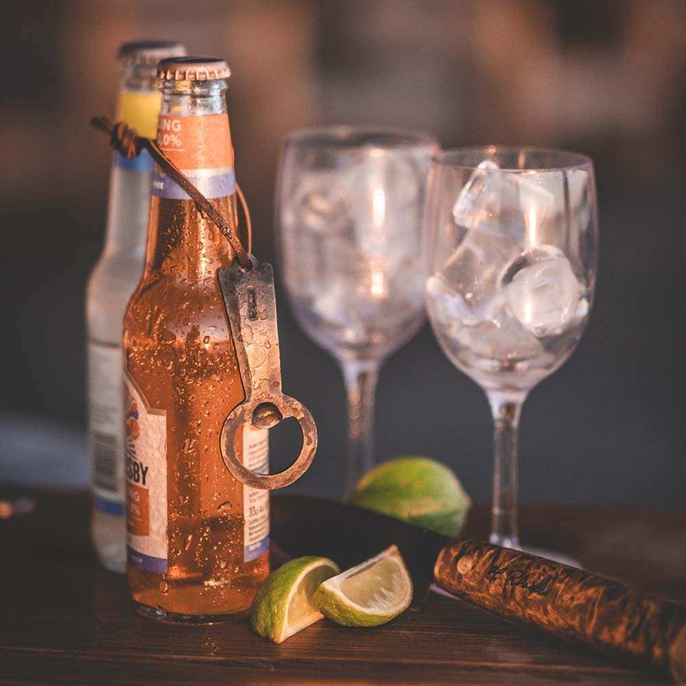 Rosellis hand crafted bottle opener made from spilled materials of our premium carbon steel.