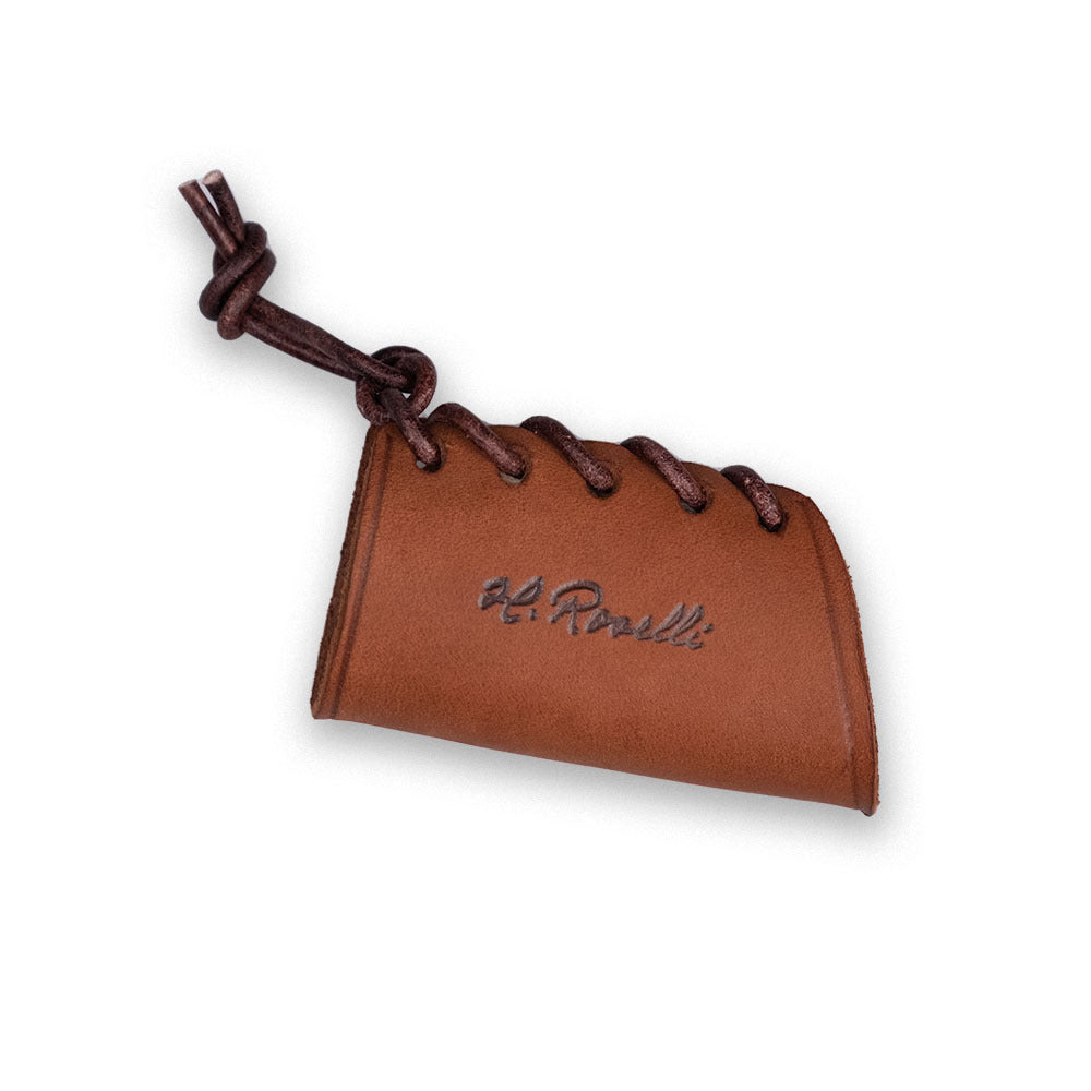 Roselli's Finnish handmade Overstrike Guard for protecting the axe. Made out of dark vegetable leather.